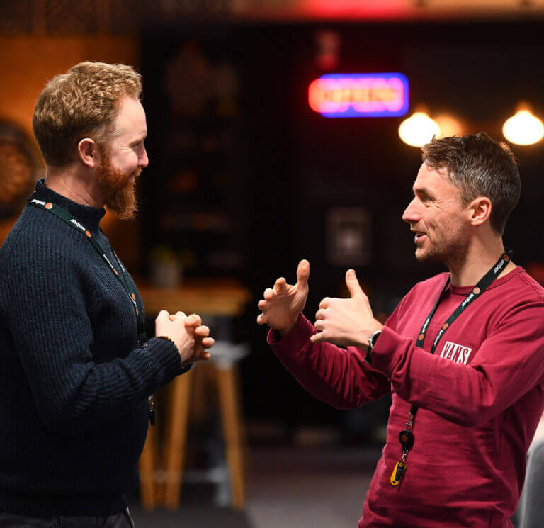 A picture of two amber colleagues